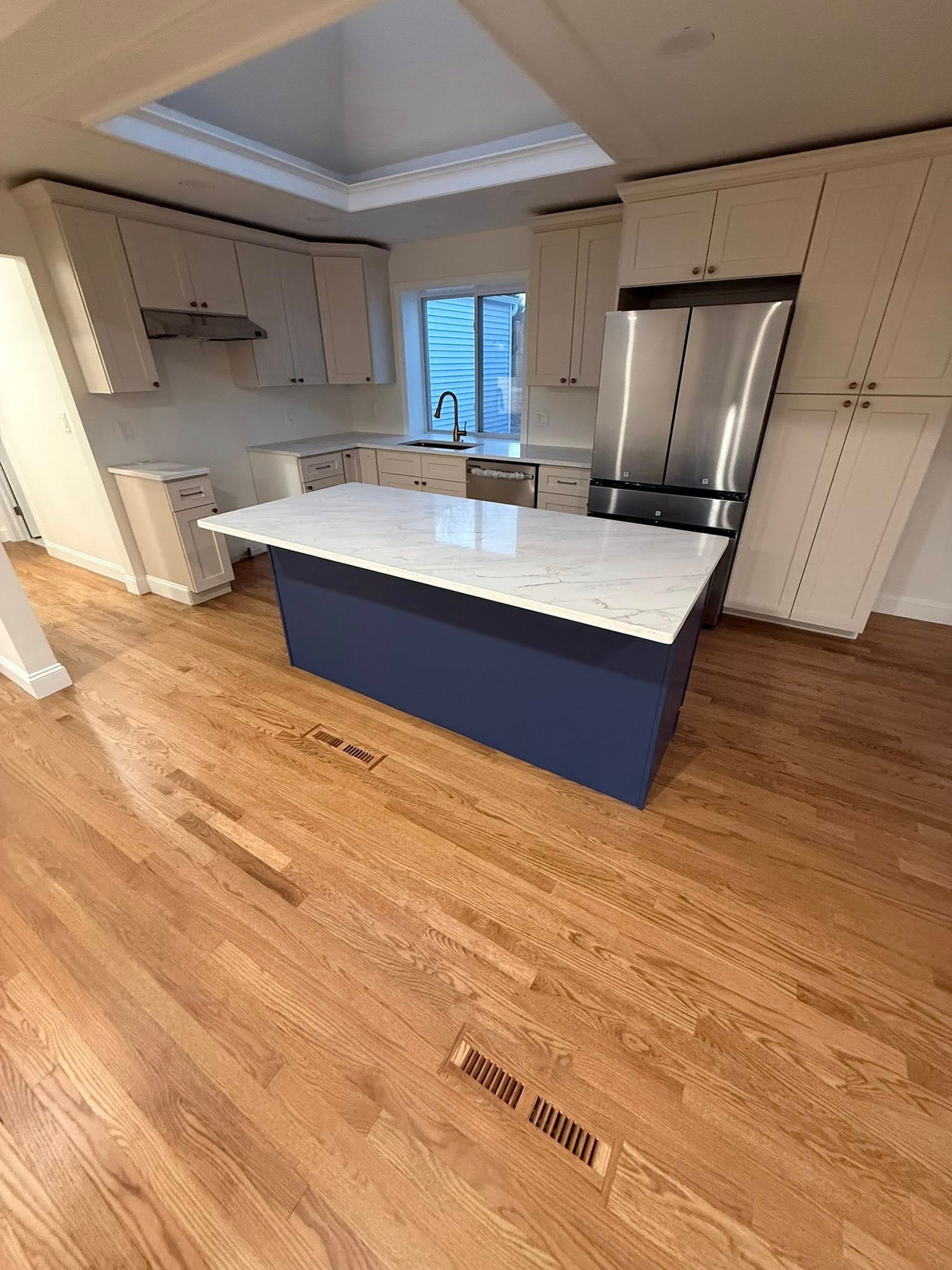 Revamped staircase with Newell posts and open risers